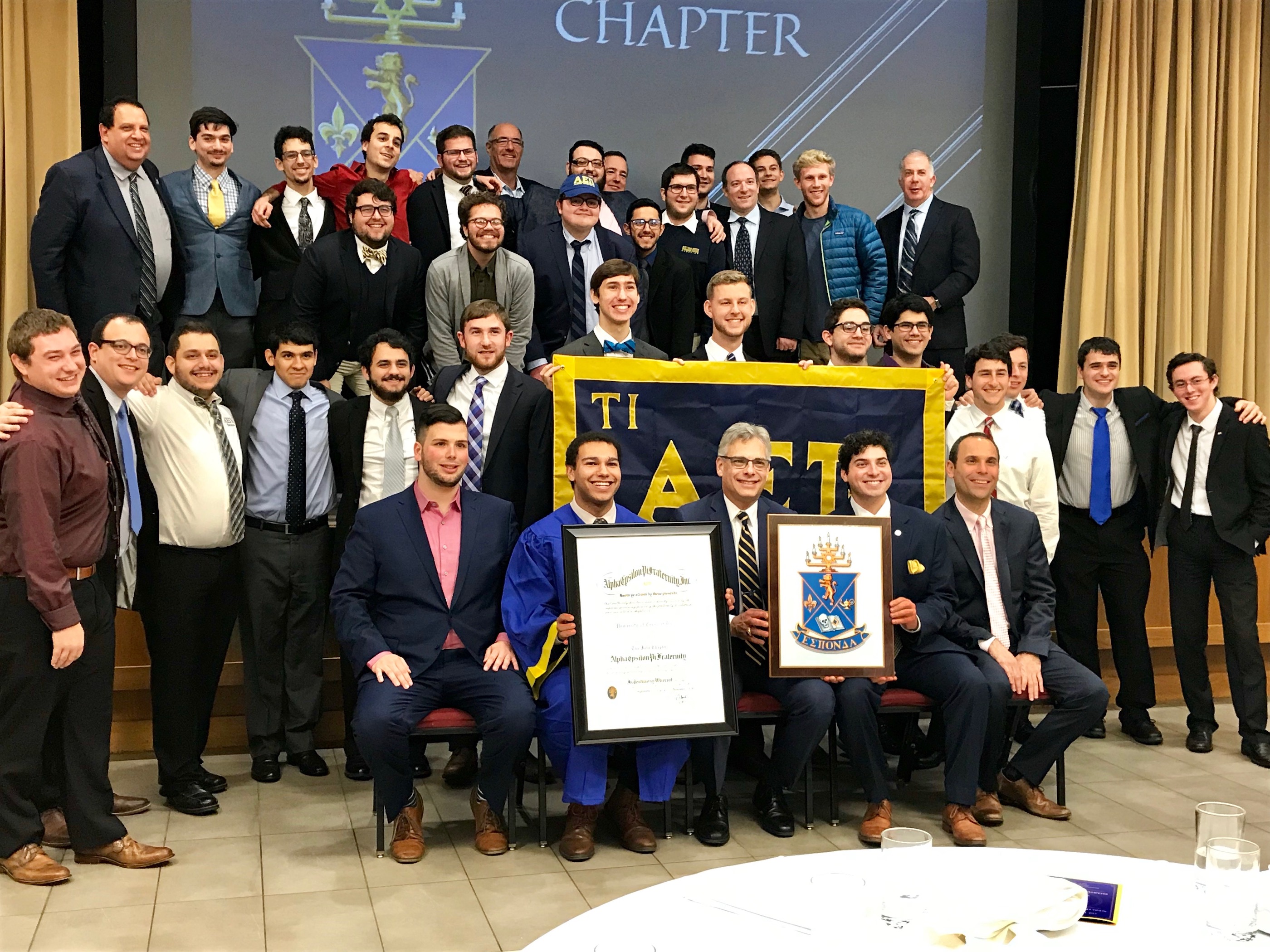 Brothers of Tau Iota take a group photo with Educational Leadership Consultant (ELC) Justice Roy (North Texas, 2017) and Supreme Master Jeff Jacobson (Northern Arizona, 1992).