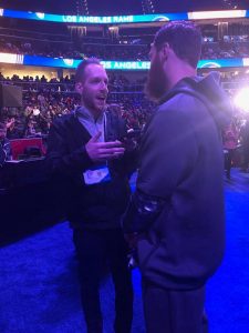 Will Collins (Kent State, 2014) at Super Bowl Week talking to Julian Edelman